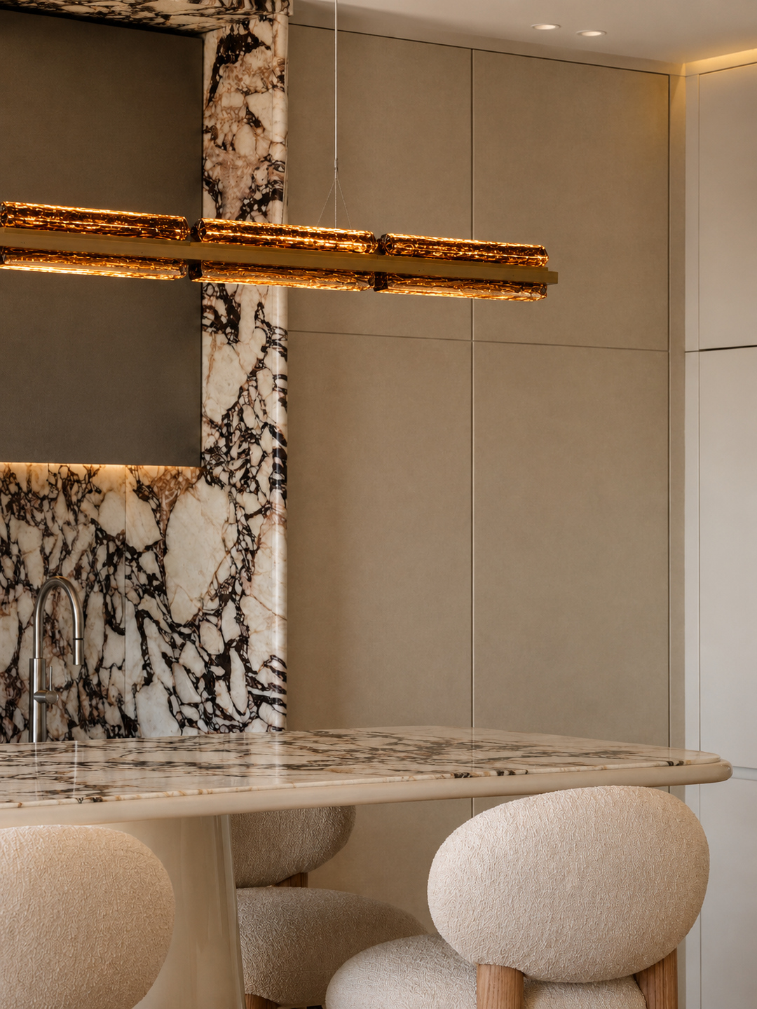 Modern designer linear pendant light for luxury kitchens and dining spaces.