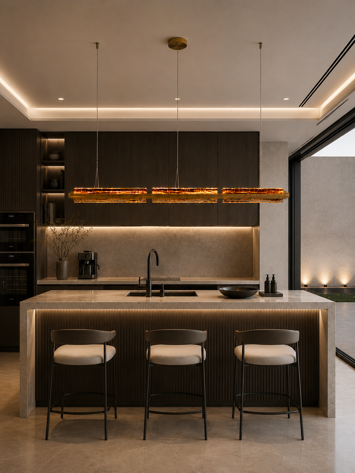 Running Water Horizon luxury linear pendant light above a modern kitchen island with hand-blown textured glass.