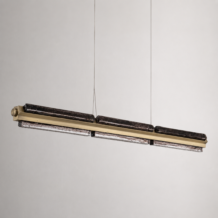 Architectural LED linear pendant with smoked textured glass and brushed nickel finish.