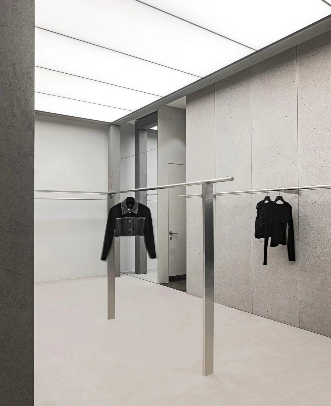 Lucretia stretch ceiling panel delivering soft, even retail lighting for boutique clothing stores.