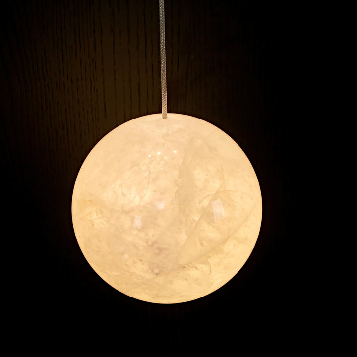 White natural agate pendant light with genuine translucent stone and integrated LED lighting for luxury interiors.