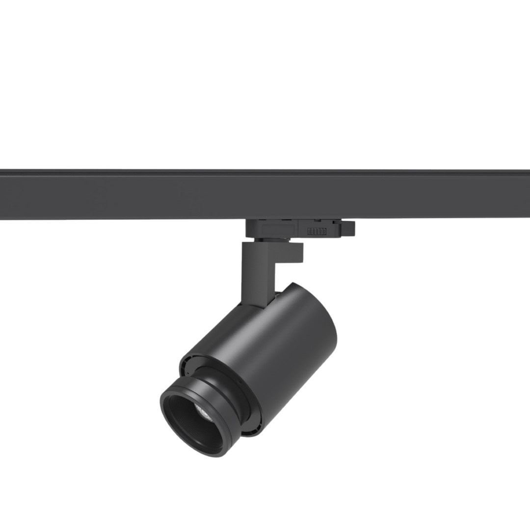 Lucretia zoomable LED track light mounted on track system, ideal for gallery displays and focused artwork lighting.