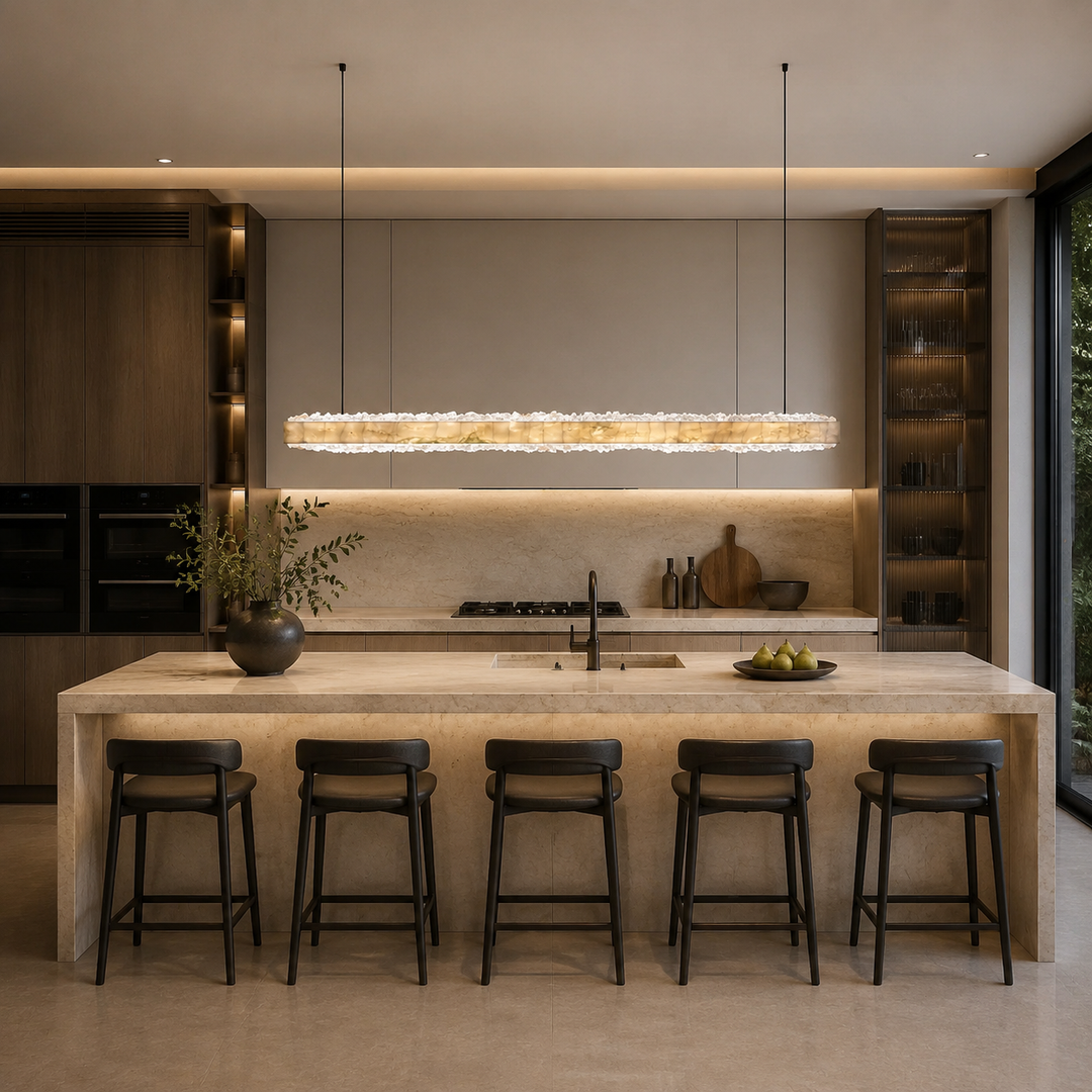Luxury marble linear pendant light with crystal detailing above a kitchen island, contemporary LED suspension light for bespoke homes, modern kitchens and designer interiors.