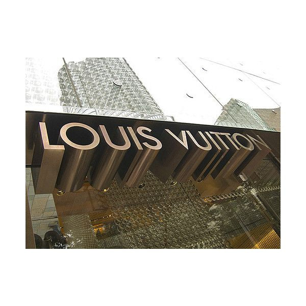 Luxury retail storefront with custom 3D structural letter signage