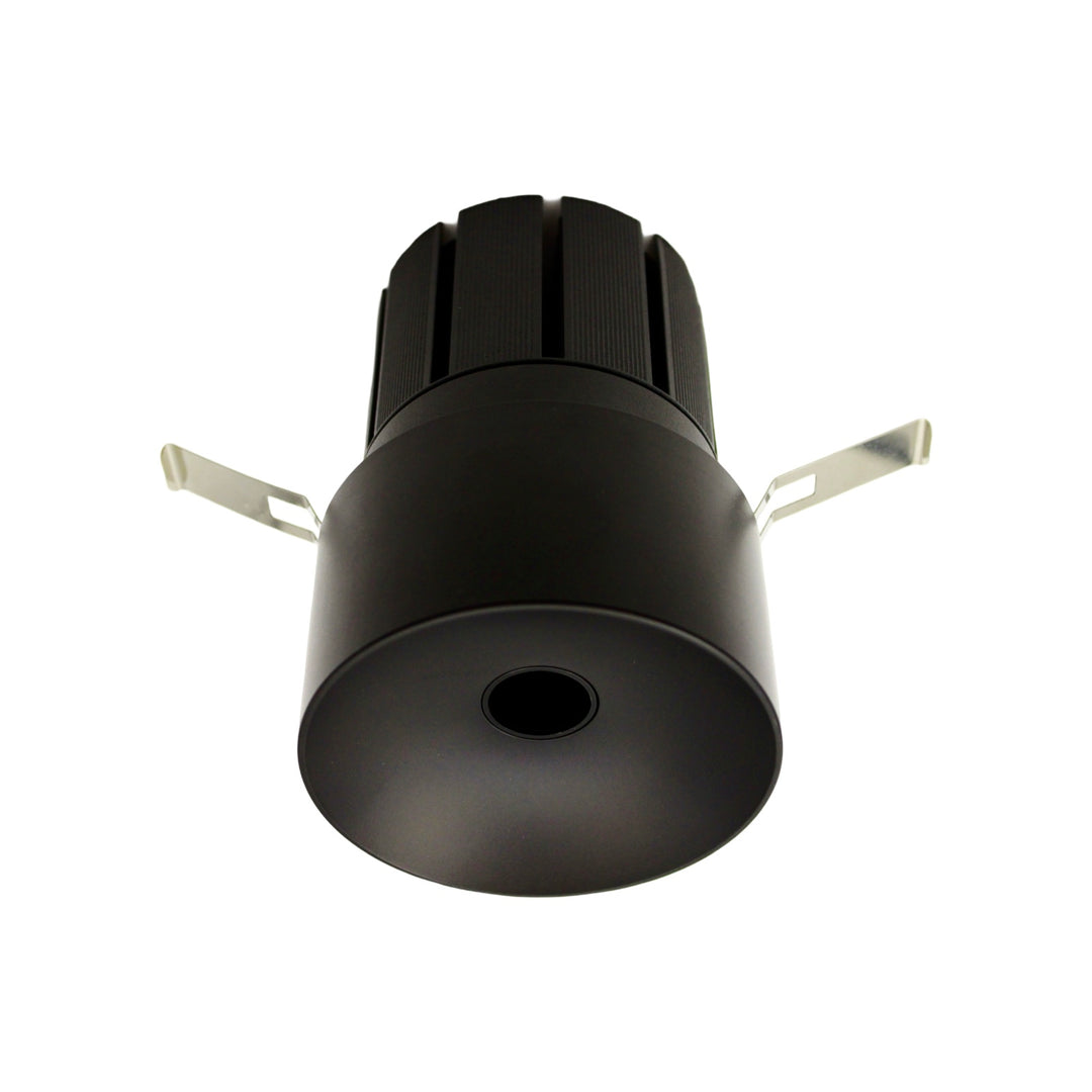 Mini pinhole downlight showing discreet 1cm light aperture and compact housing design