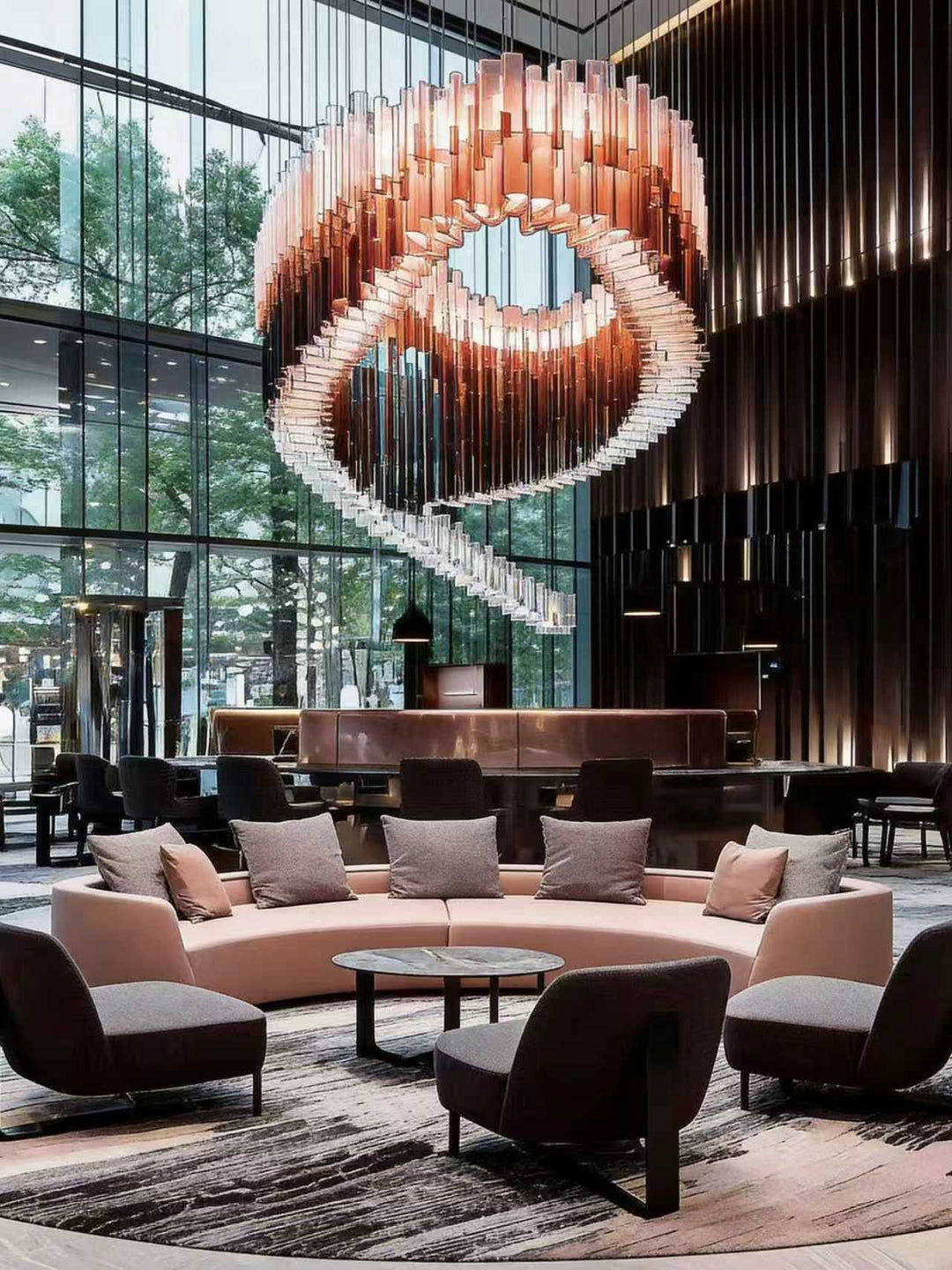 Modern architectural glass pendant light for commercial lobby and hospitality spaces