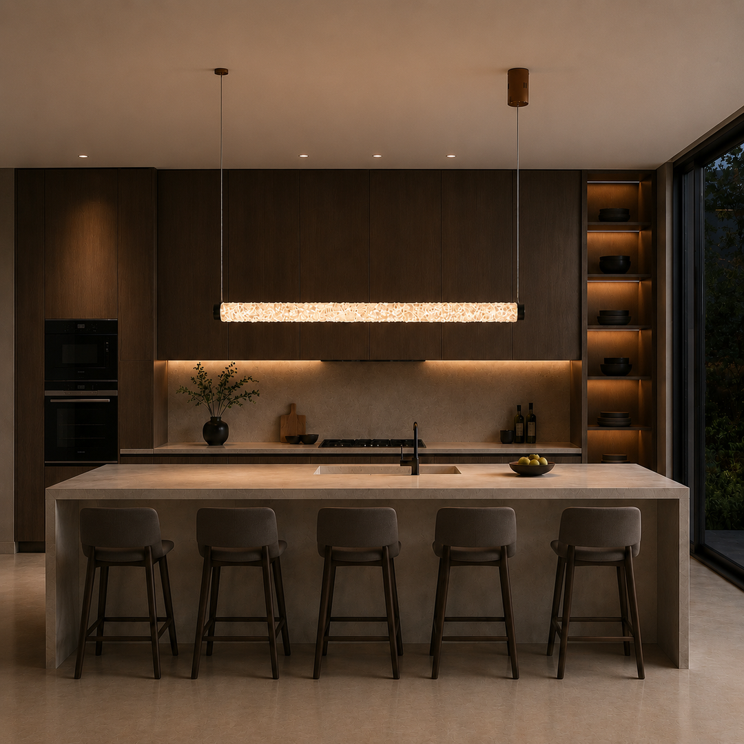 Modern crystal linear pendant light above a kitchen island, handcrafted LED suspension light for luxury kitchens, dining spaces and contemporary residential interiors.