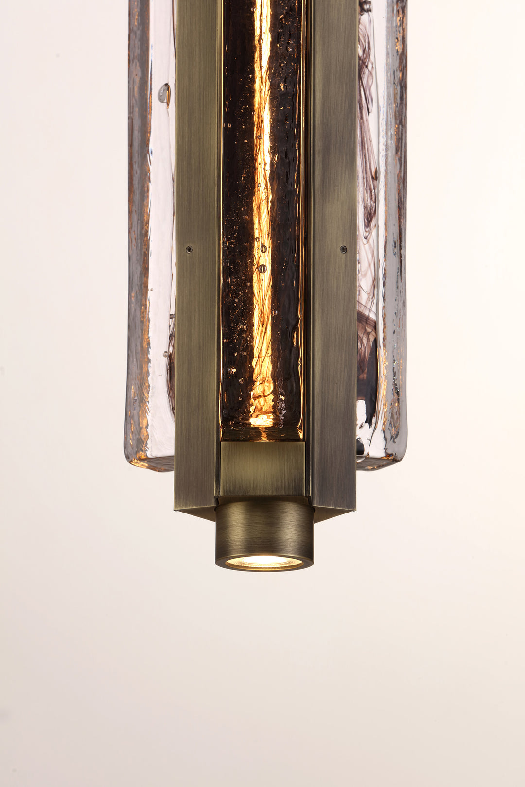Front detail of hand-blown glass pendant light, Running Water trio design for modern interiors