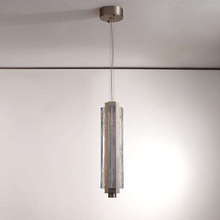 Single hand-blown glass pendant light in modern interior, Running Water trio design for ambient lighting