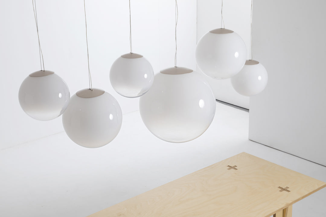 Modern glass sphere hanging light with soft diffused illumination