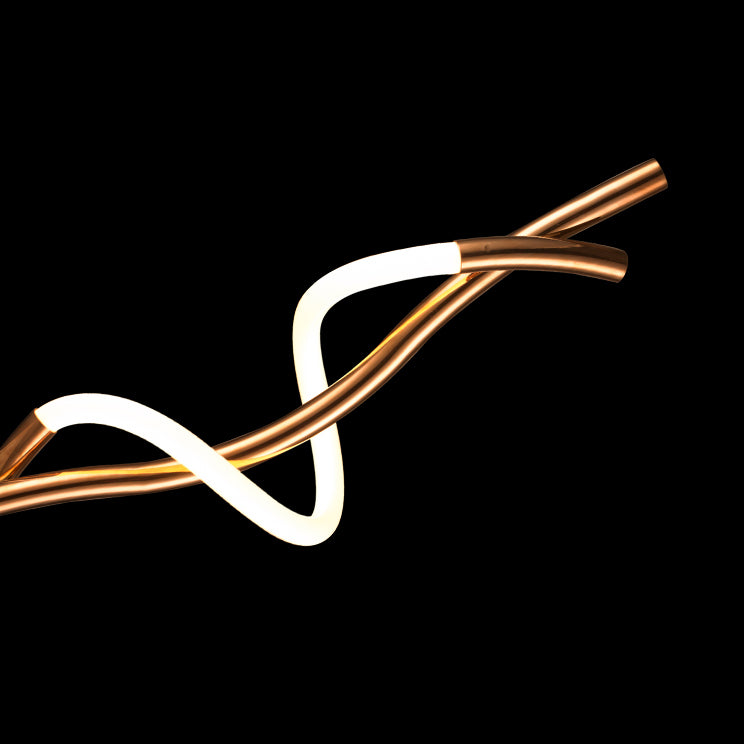 Modern LED curve table lamp with artistic wave design, perfect for decorative bedside lighting, study desks and contemporary home styling.