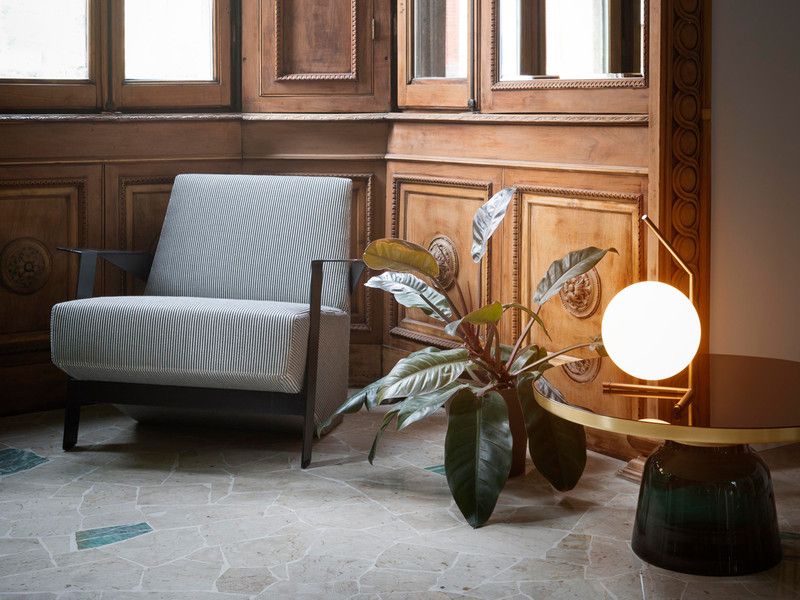 Modern opal table lamp used as a decorative living room accent light, creating soft evening illumination for Australian home interiors.