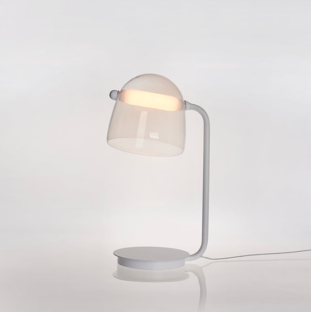 Modern Swing Table Lamp featuring white glass shade with soft diffused ambient light perfect for reading corners, workspaces and contemporary interiors.