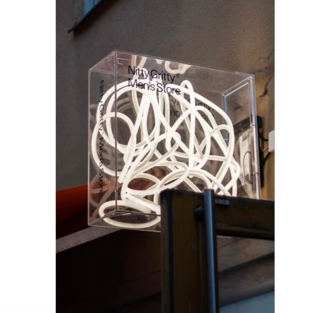 custom neon art box with abstract LED neon design inside acrylic enclosure for artistic display