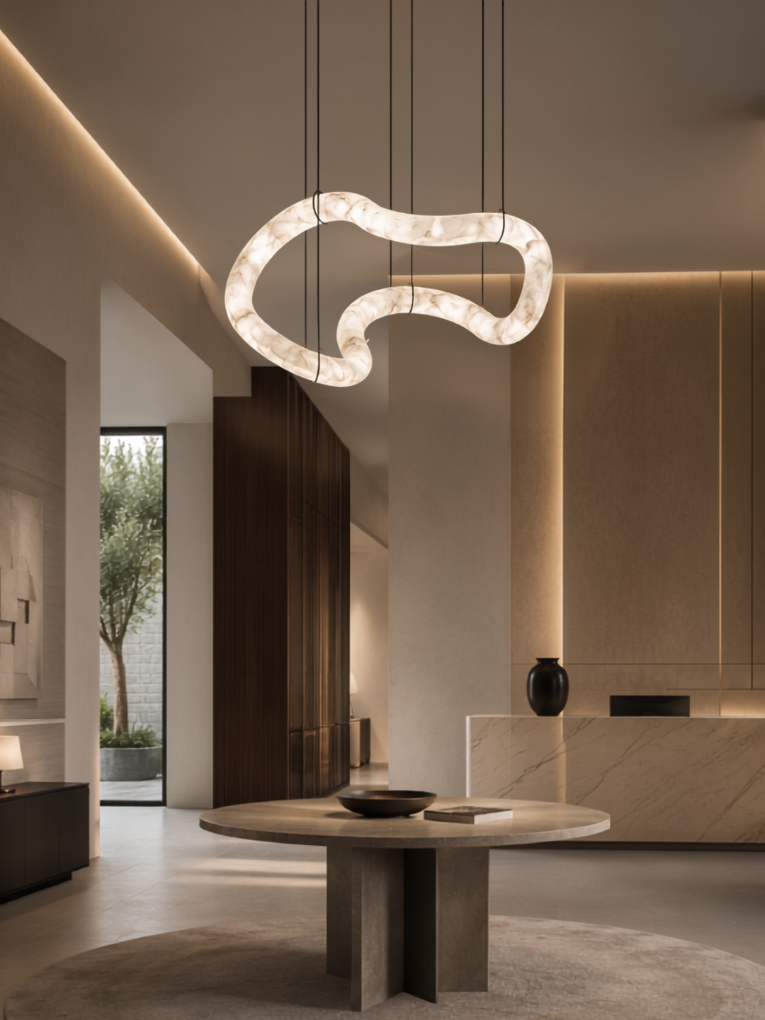 Nexus Spanish Alabaster Organic Pendant Light suspended above a luxury foyer, handcrafted from genuine Spanish alabaster.