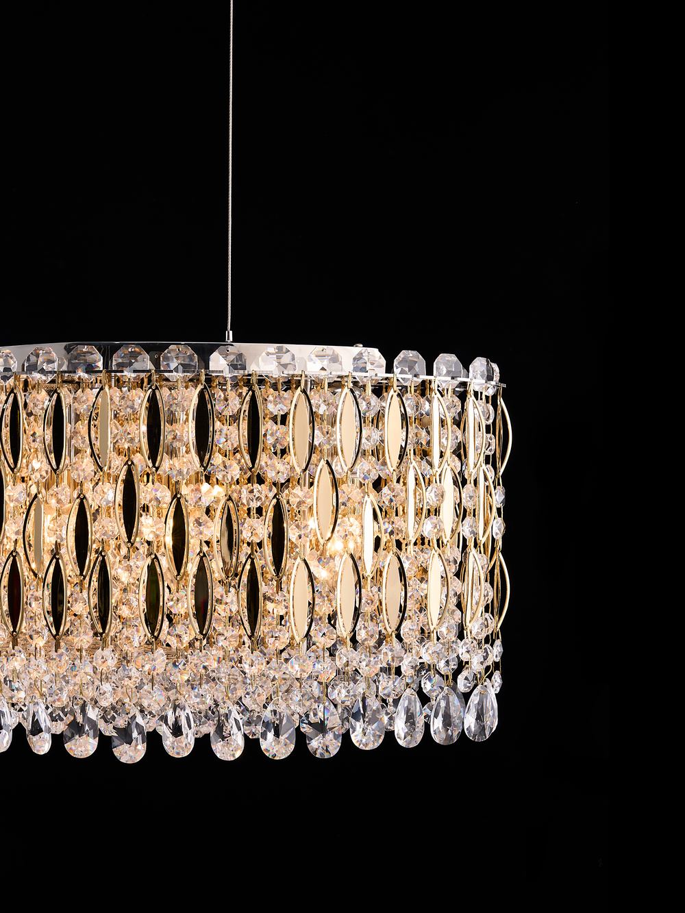 Opulent Leaf Linear Chandelier in gold with marquise leaf metalwork and tiered clear crystal beads and teardrop drops