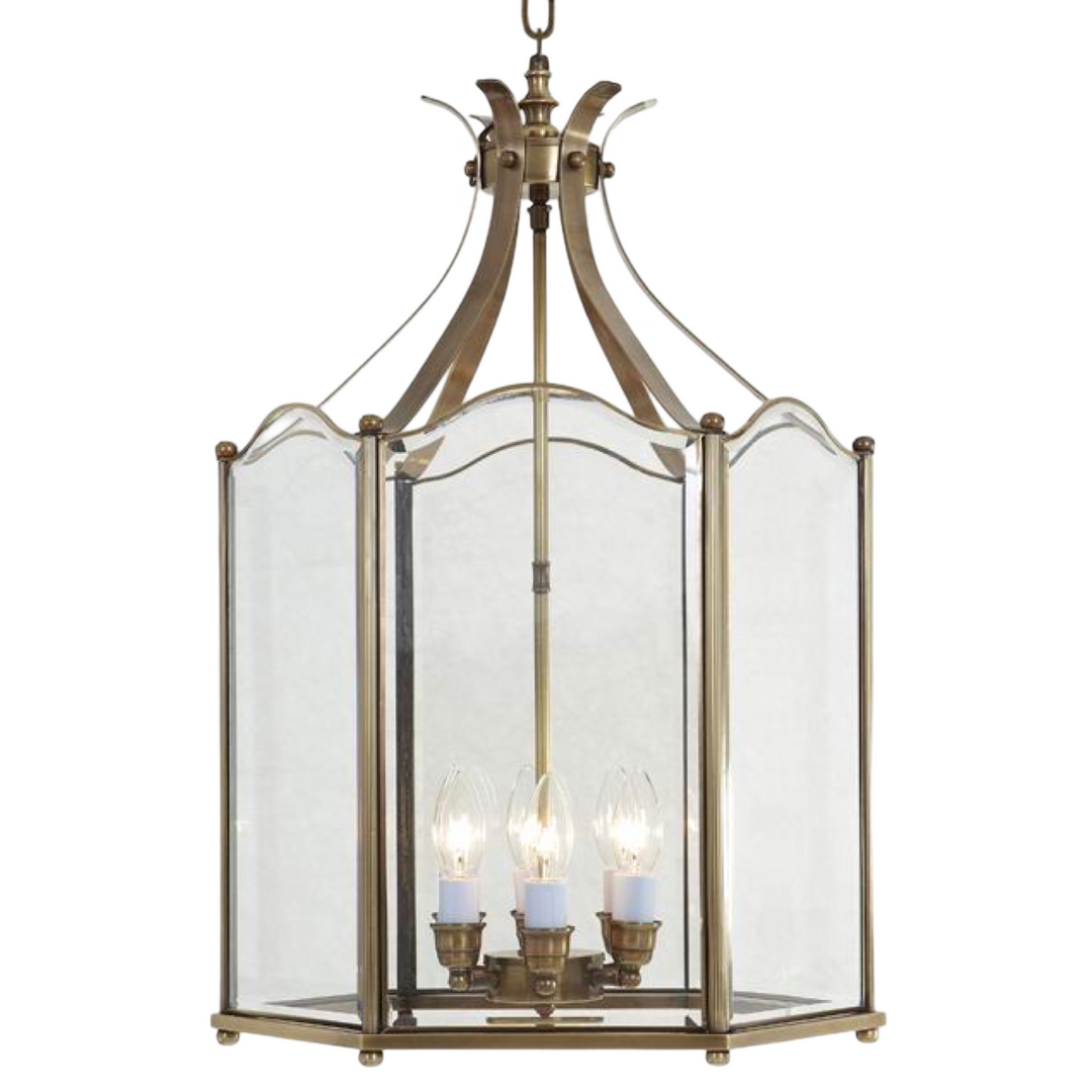 Parisian Charm brass pendant lamp with clear glass and French-inspired design.