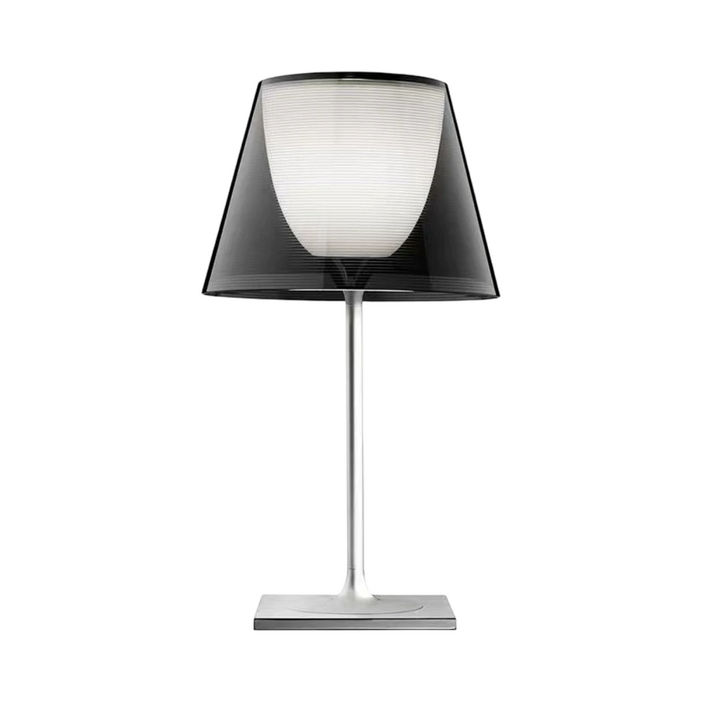 Phantom table lamp featuring a smoked acrylic shade and sleek metal base, perfect for contemporary bedrooms, desks and minimalist interiors.