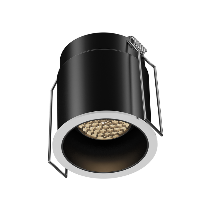Front view of the PIN 55 narrow beam architectural downlight with precision 5° optical lens.