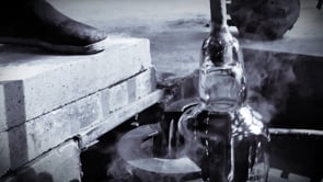 Handcrafted glass lighting process for faceted crystal wall light