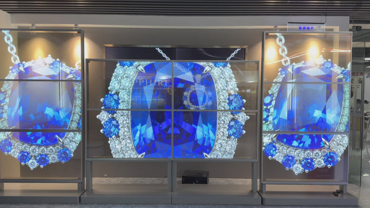 Transparent OLED jewellery showcase display with interactive digital content and product presentation