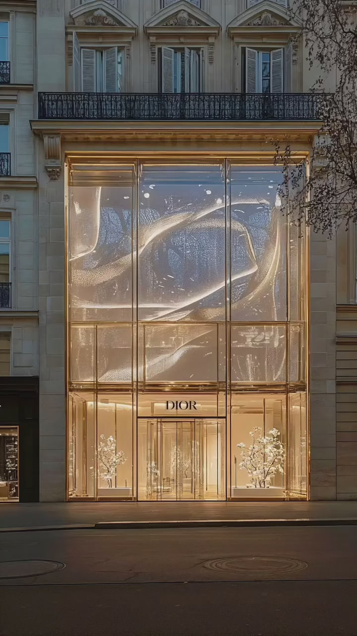 Transparent Holographic LED Display integrated into a commercial building glass facade