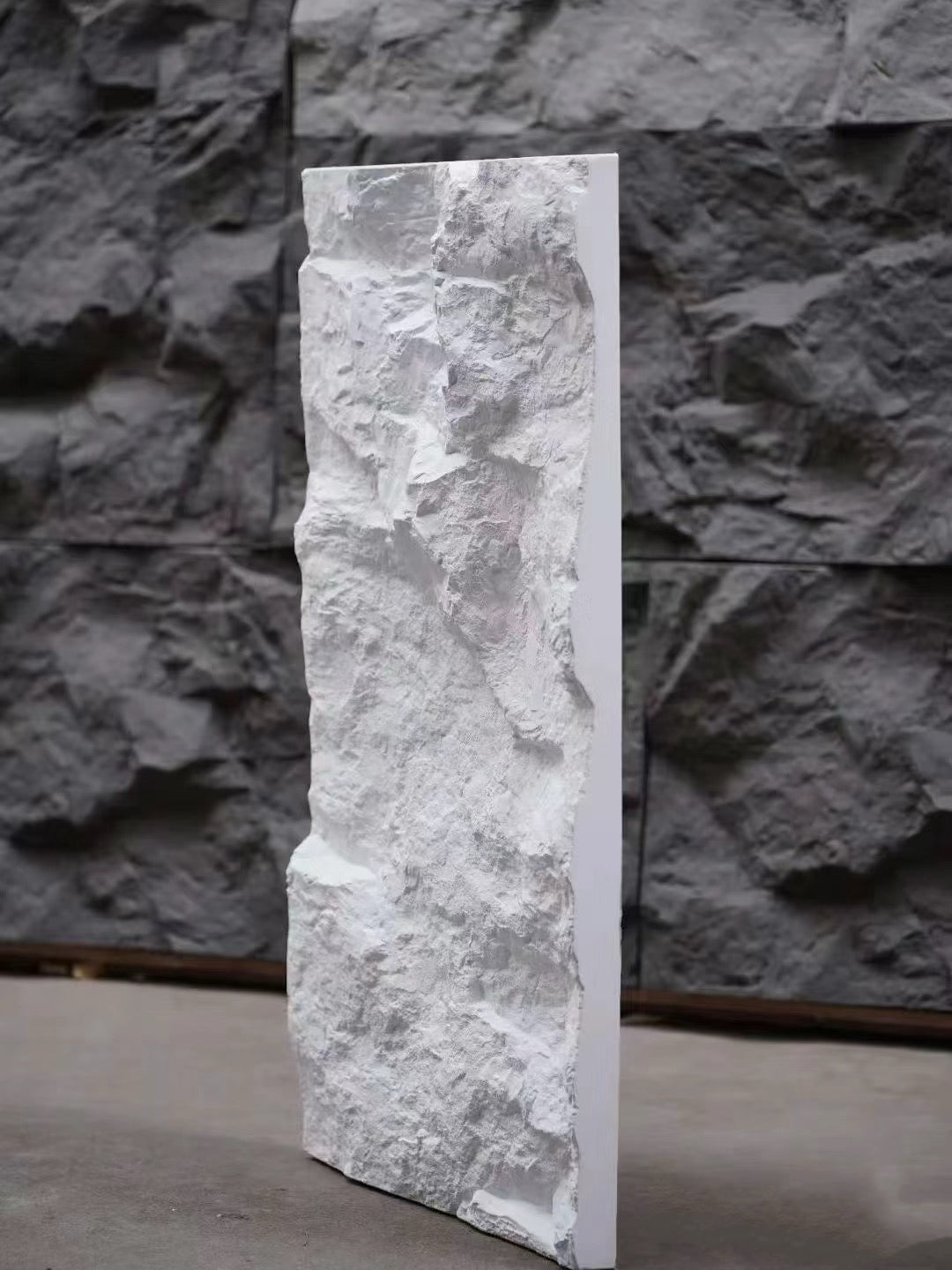 Side view of PU rock wall panel highlighting stone-look texture and three-dimensional surface