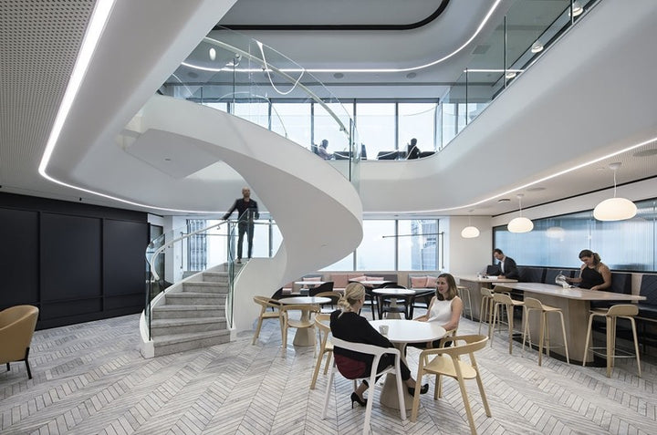 Recessed curved LED linear lighting solution for offices and hospitality interiors with continuous ceiling illumination