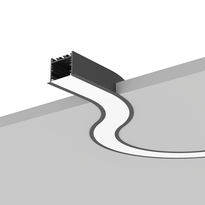 Recessed curved architectural LED linear lighting system integrated into gypsum ceilings for commercial interiors