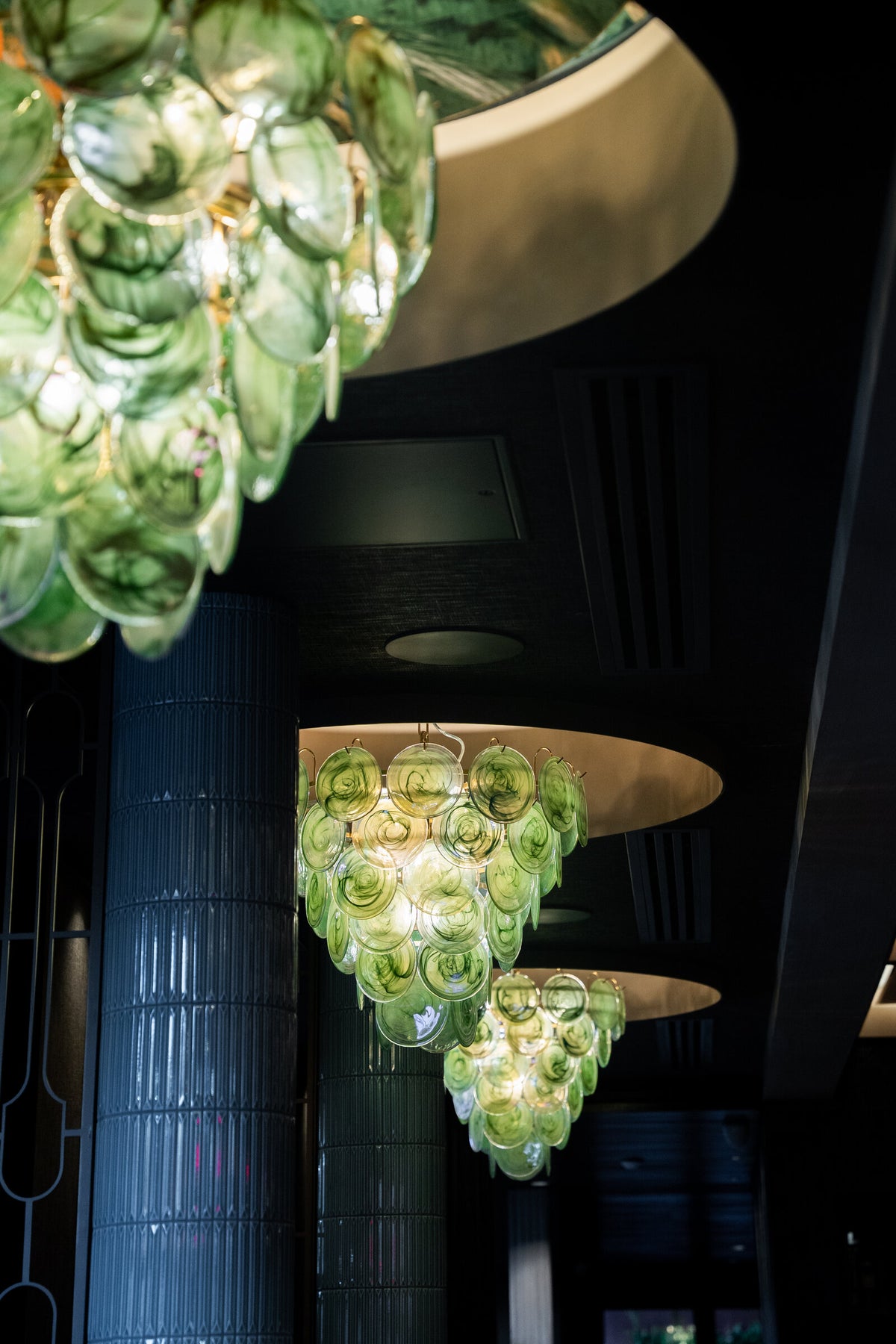 Green ColorWave pendants in hand-blown glass in the dining rooms