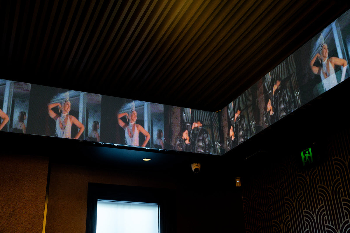 The wraparound LED banner turning the corner of the gaming room