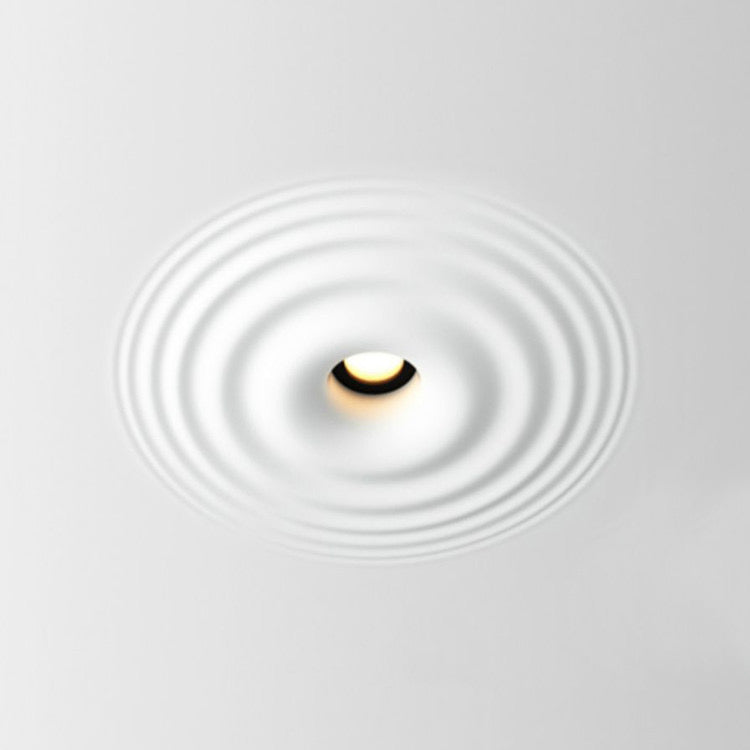 Ripple Gypsum 305 trimless downlight creating architectural water ripple effect on plaster ceiling