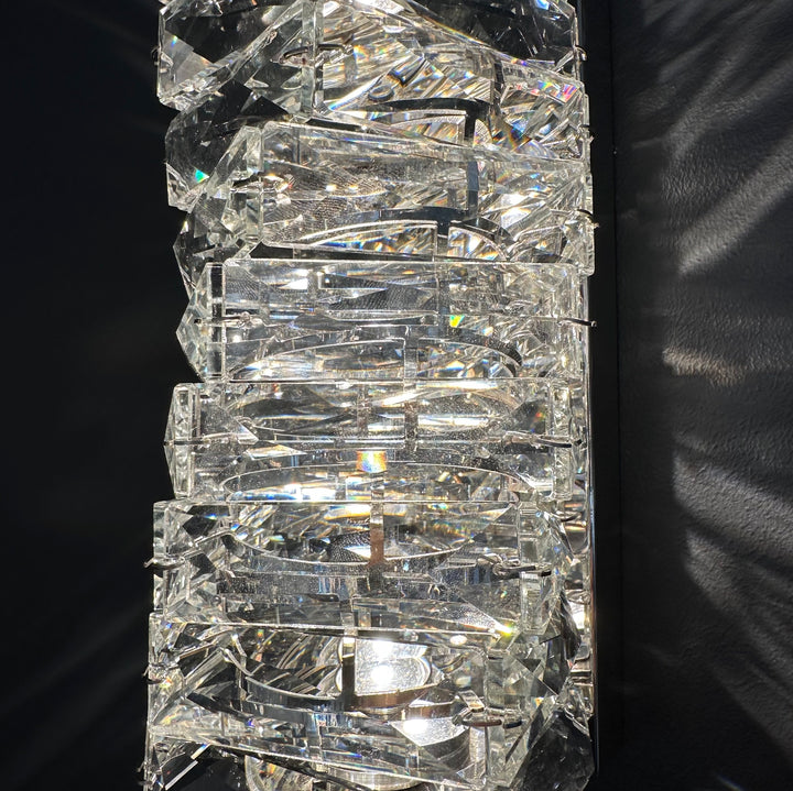 Detailed texture of the Savoy Wall Lamp 460 showcasing layered K9 crystal and stainless steel construction for luxury interior wall lighting