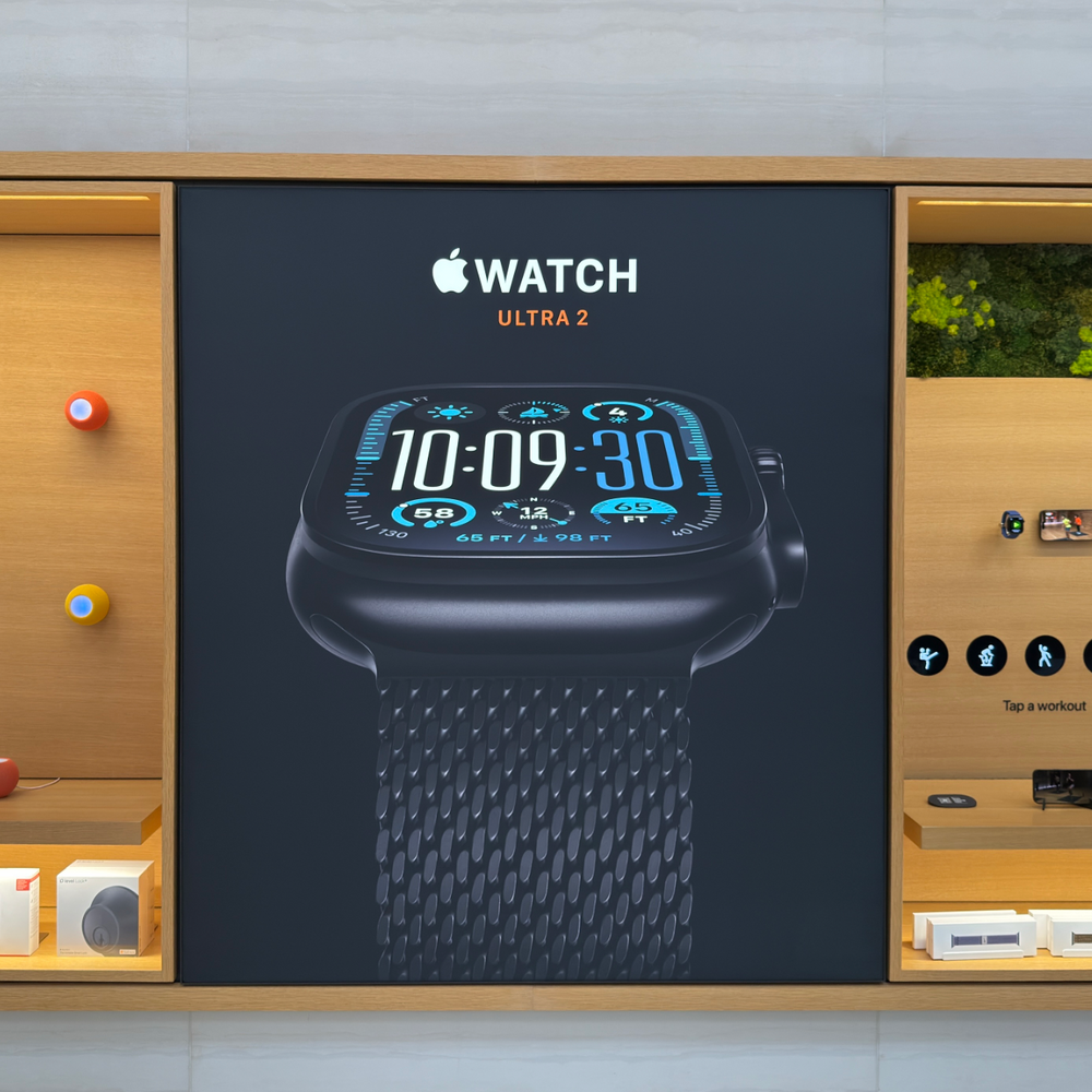 Backlit SEG fabric lightbox used for illuminated advertising graphics in a retail environment.