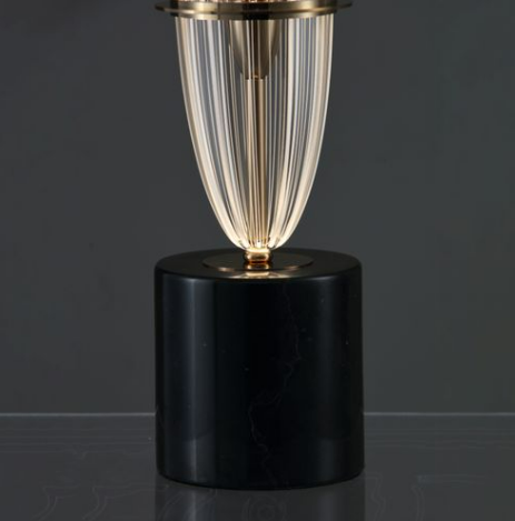 Detail view of Selene Trio Floor Lamp with sculptural glass lighting element.