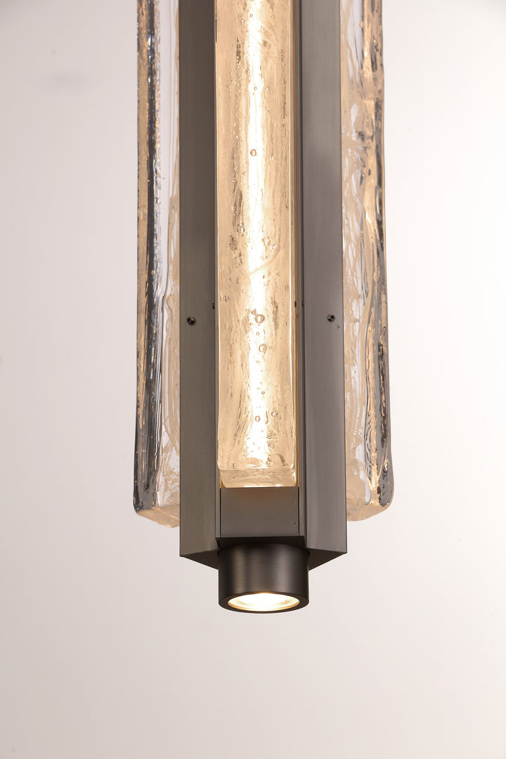 Close-up of smoked clear hand-blown glass pendant light, Running Water trio design with textured finish