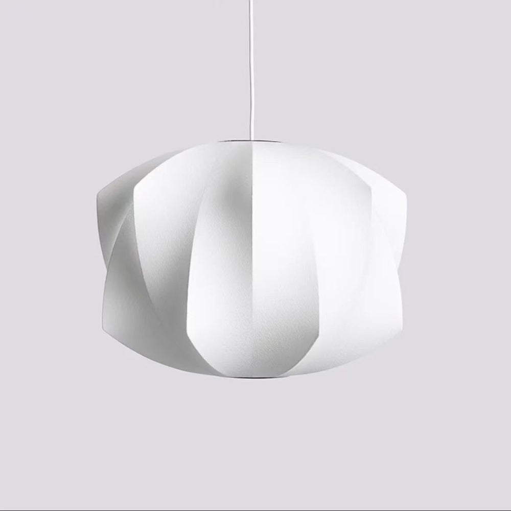 a softly illuminated pendant light shown against a neutral background, highlighting its sculptural form and gentle diffused glow