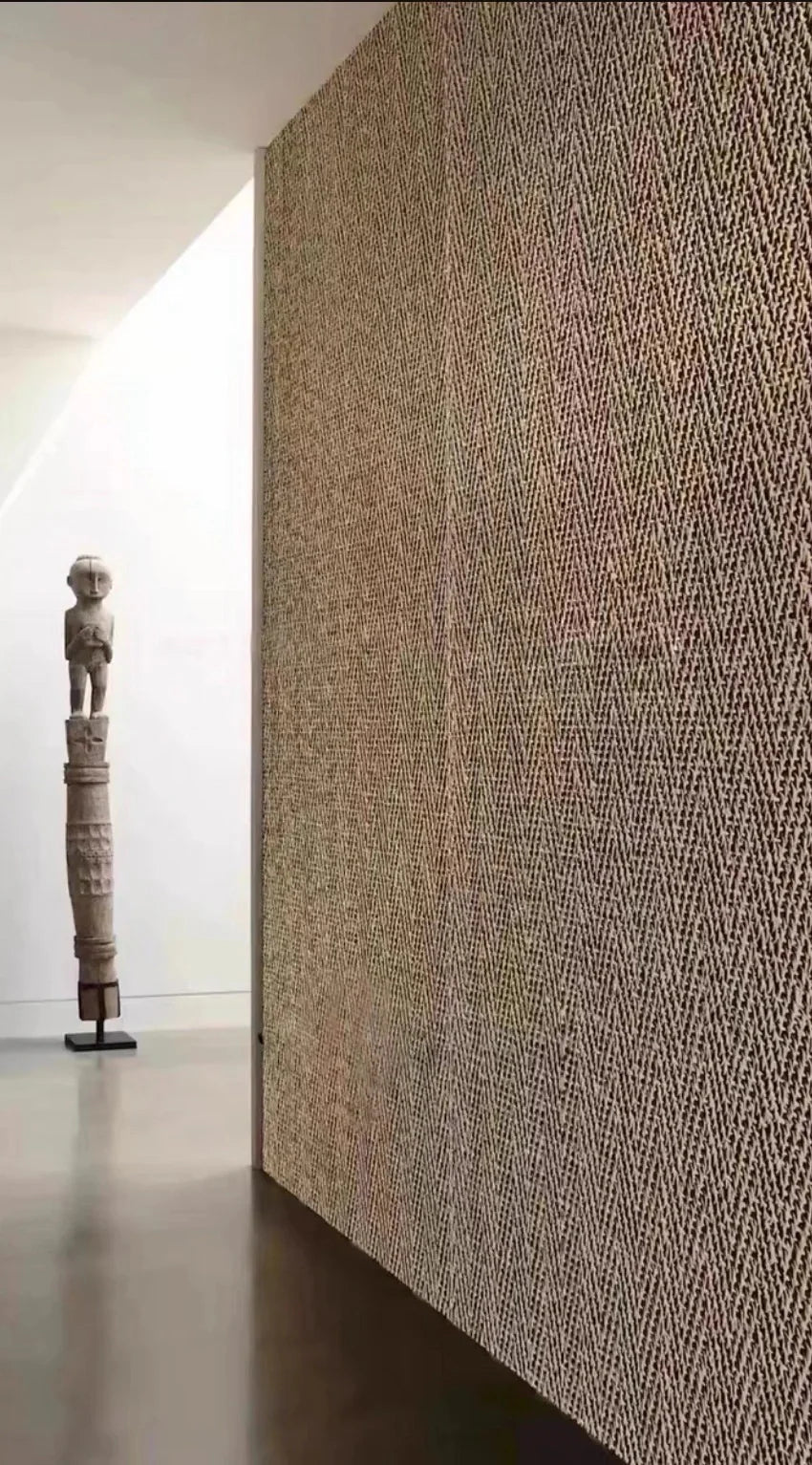 Soft Stone hemp weaved wall panels installed vertically in a modern interior space