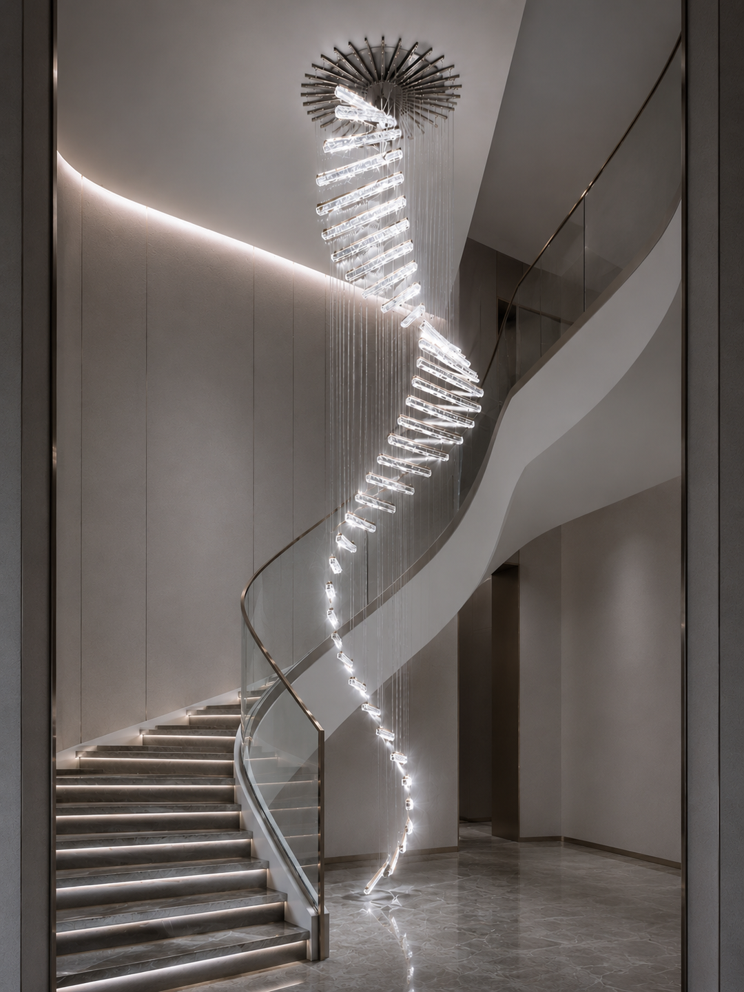 Spiral crystal staircase chandelier with starburst ceiling canopy in a modern residential staircase void with glass balustrade and warm step lighting, Escalier de Cristal Custom Pendant by Lucretia