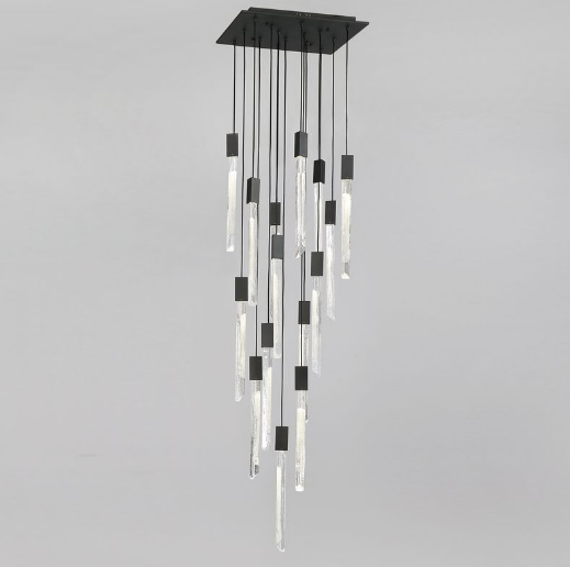 Vertical stair void chandelier crafted from Swedish-imported glass with cascading pendant lights and square ceiling canopy