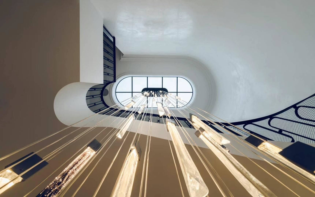 Modern Swedish glass void chandelier with cascading vertical pendants and square ceiling canopy