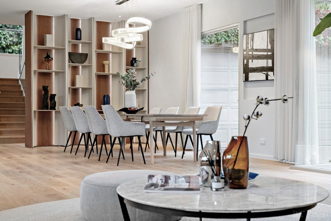 Pharaoh pendant in front of the curved dining room shelving