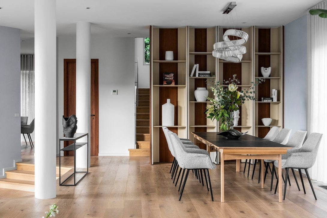 Pharaoh pendant rising in a spiral above the formal dining table