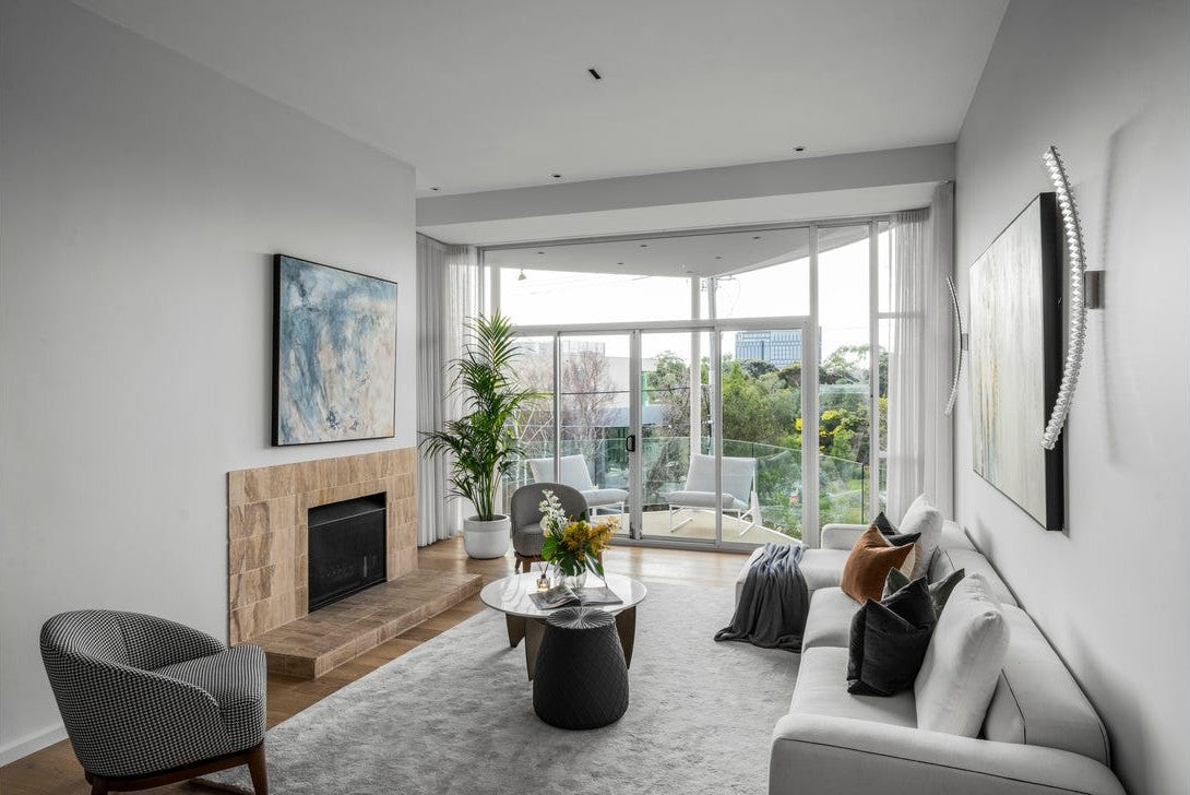 Living room with the Pharaoh wall light and the fireplace