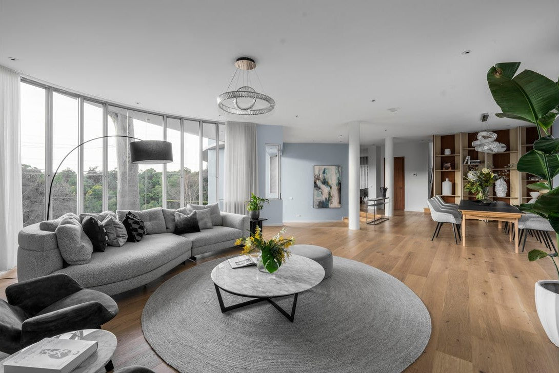 Pharaoh pendant over the open-plan living room, with the dining room beyond