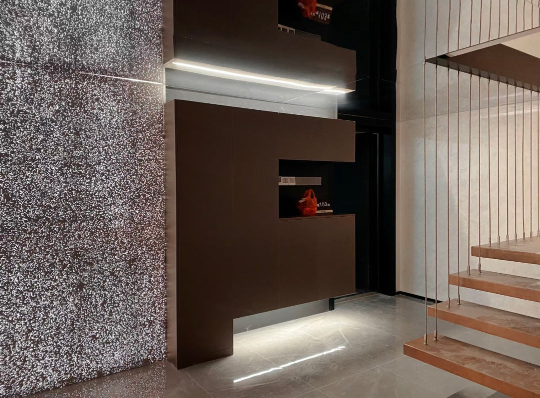 Transparent concrete wall panel integrated into staircase interior design