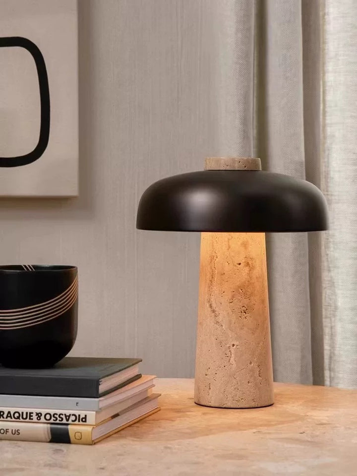 Travertine bedside table lamp styled in a contemporary room, offering soft warm lighting for bedrooms and living spaces.