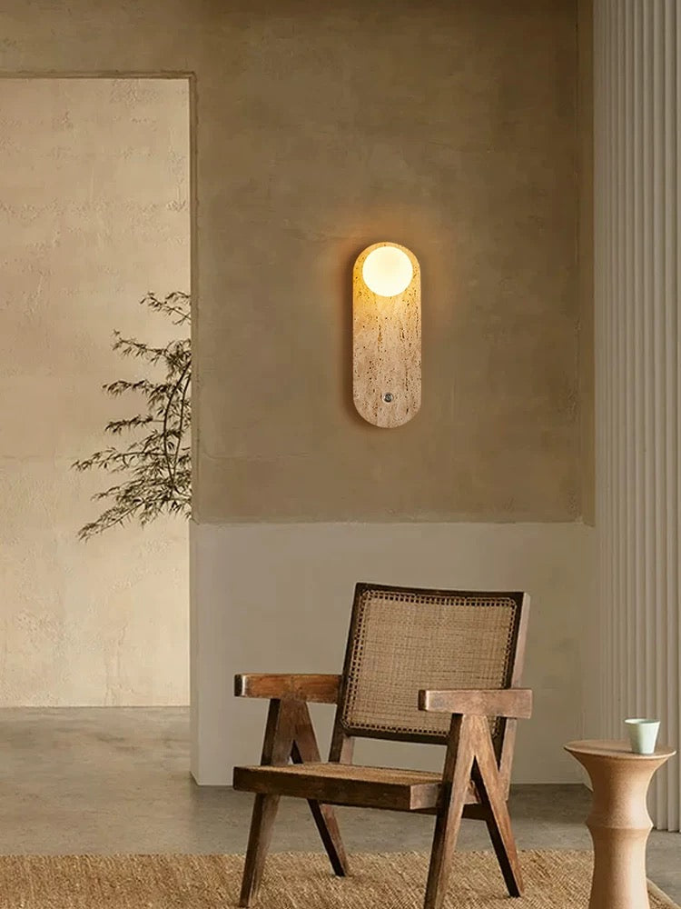 travertineglow 350 stone wall light illuminating a contemporary living space with natural warm ambient lighting