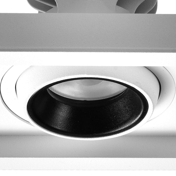 Triple-head recessed grid LED downlight with adjustable optics for commercial interior lighting