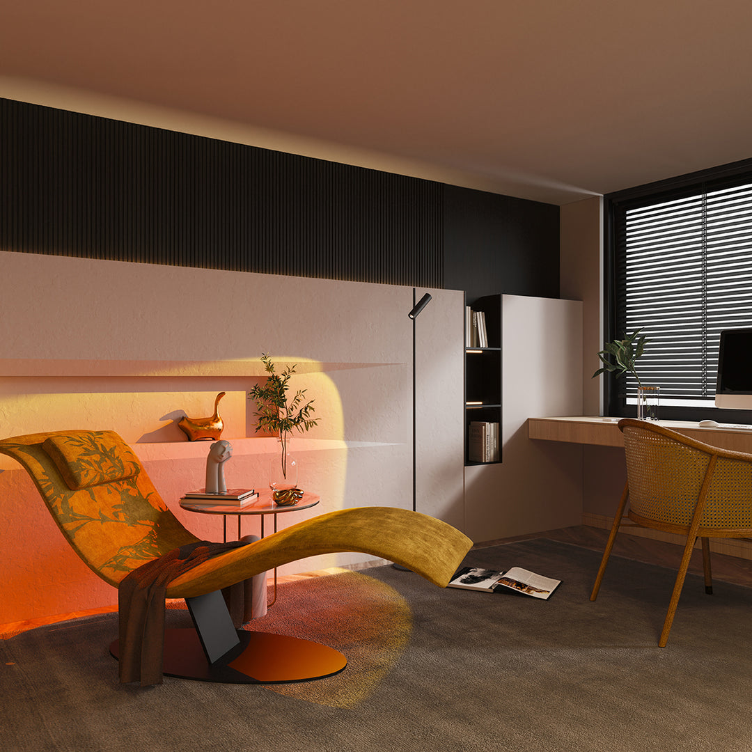 Twilight floor lamp in sunset red creating warm ambient wall wash lighting in a modern living room setting.